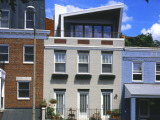 Row House Features DC’s First Solar Chimney