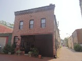 Back to the Future in DC With More Corner Stores, Alley Dwellings